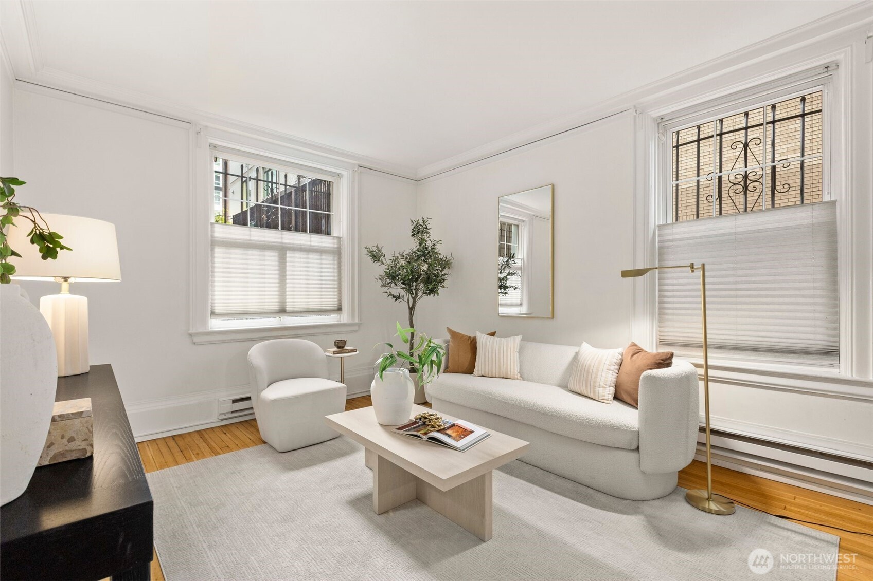 615 Boren Avenue, Unit 6 Seattle, WA 98104 - Photo 6 of 26 a living room with furniture and a window