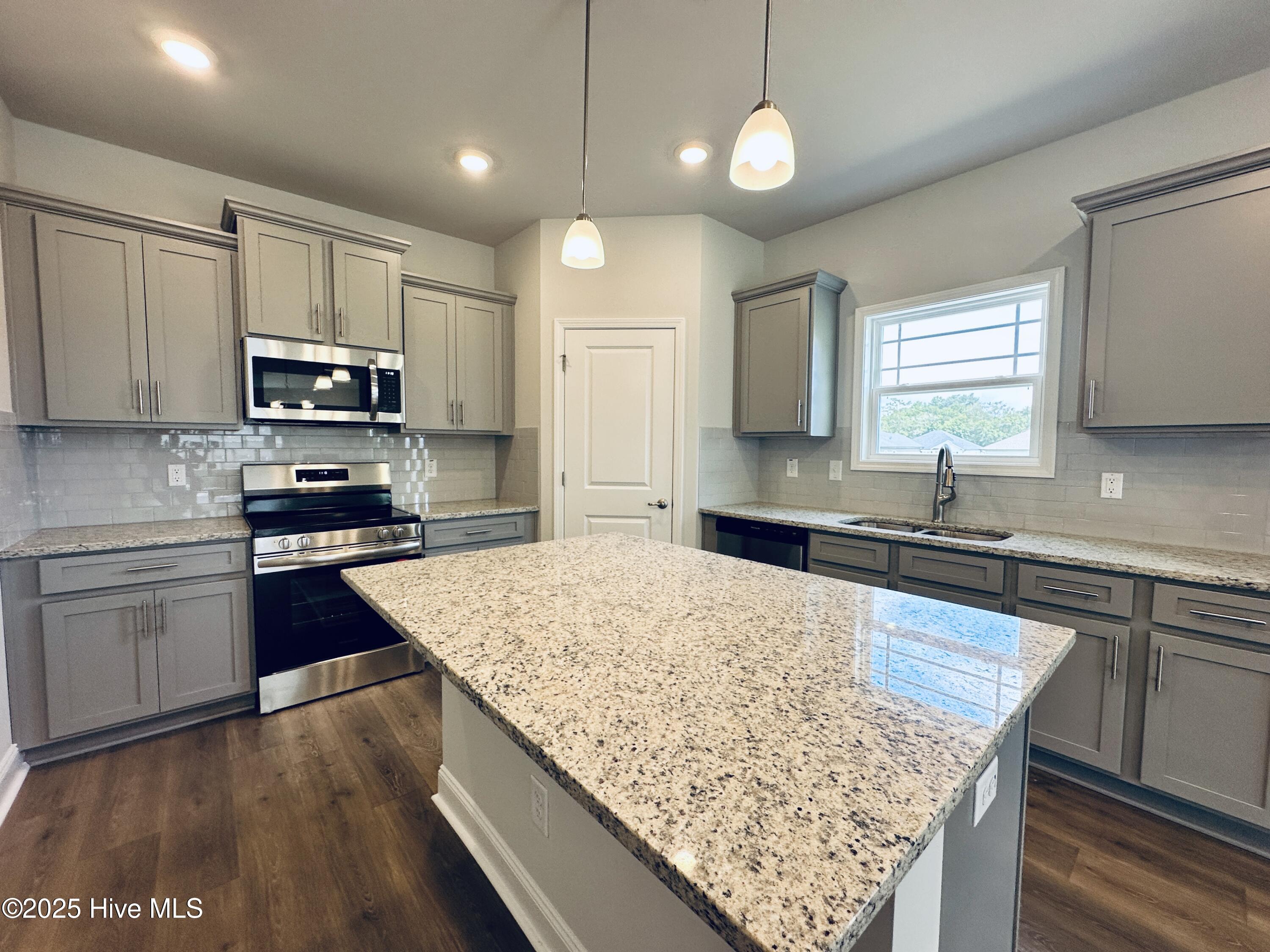 3982 Fletcher Road, Unit LOT 180 Bailey, NC 27807 - Photo 8 of 28 Kitchen Island