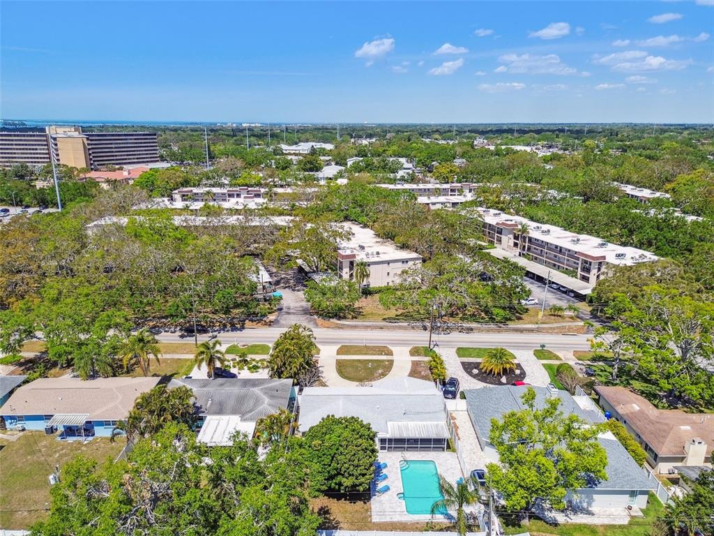 827 Virginia Street Dunedin, FL 34698 - Photo 45 of 46 an aerial view of residential building and lake