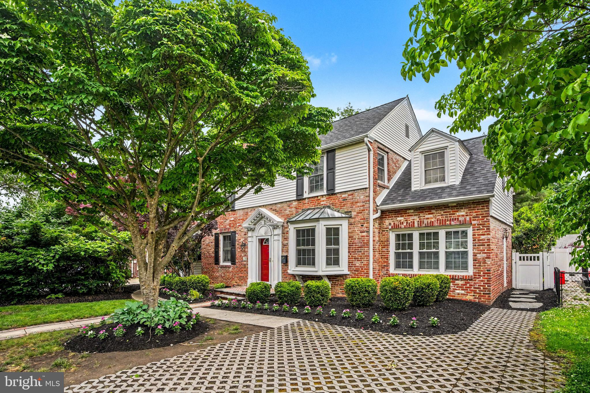 235 Hopkins Road Haddonfield, NJ 08033 - Photo 4 of 47 front view of a house with a garden