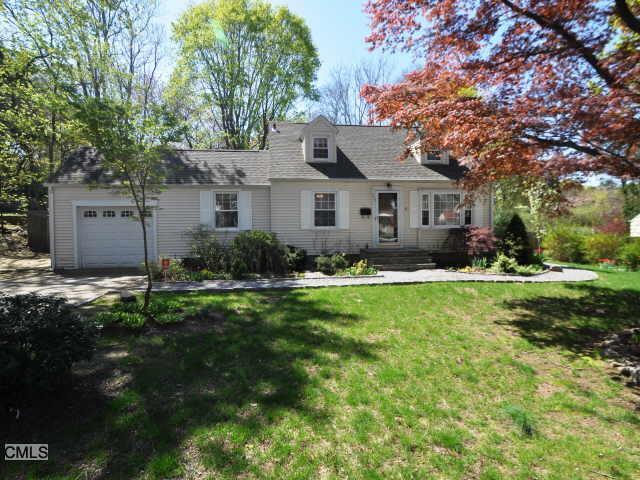 955 Unquowa Road Fairfield, CT 06824 - Photo 1 of 1 a front view of house with yard and green space