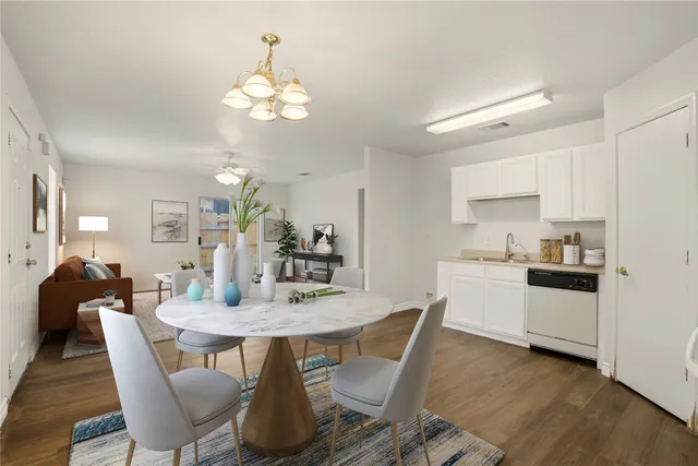 a close view of washer and dryer with kitchen countertops