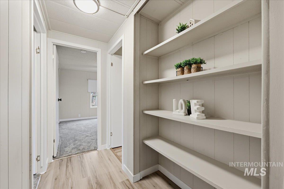 445 South Maple Grove Road, Unit 15 Boise, ID 83709 - Photo 15 of 20 Hall featuring light wood-type flooring