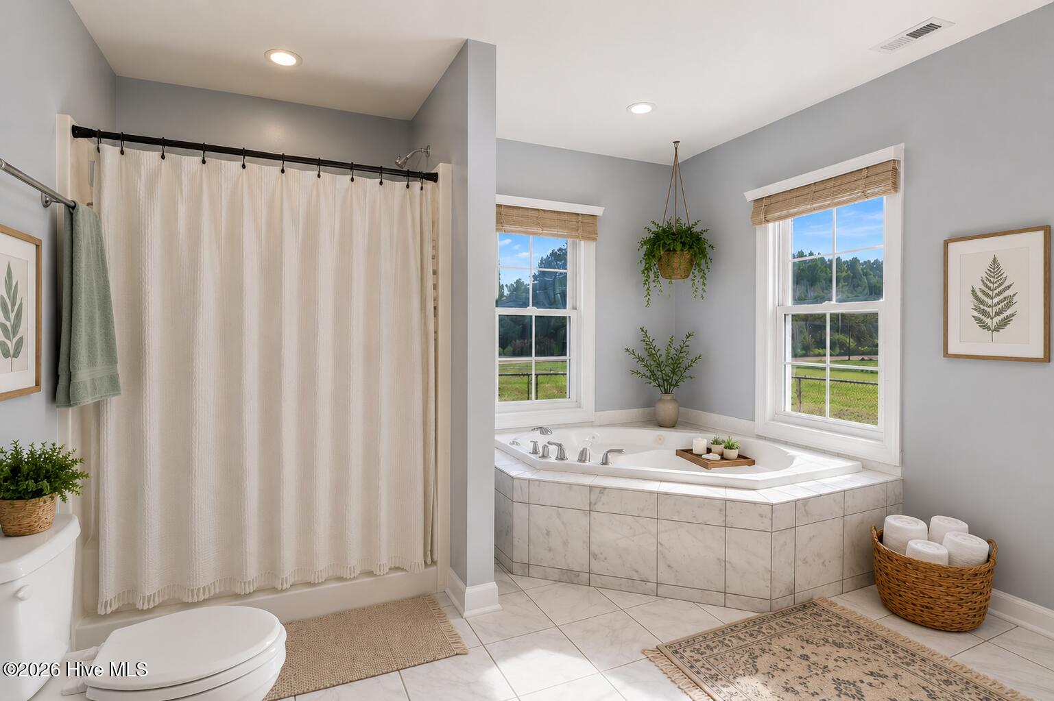 477 Harkers Island Road Beaufort, NC 28516 - Photo 21 of 38 Spacious en suite virtually staged to inspire a peaceful and relaxing retreat.