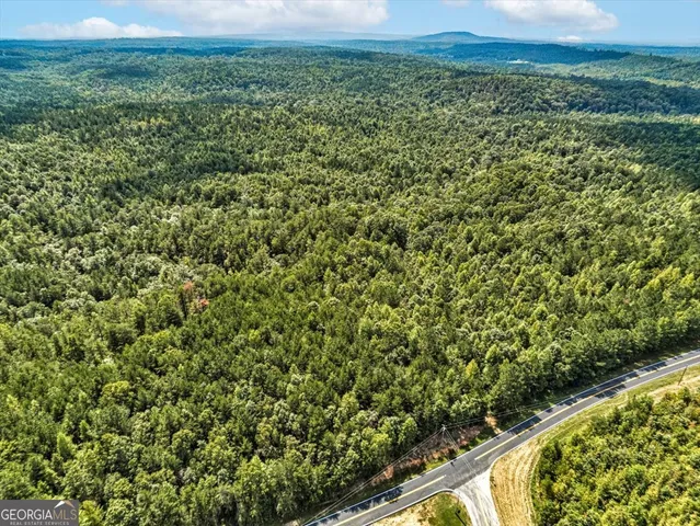 a view of a field with an outdoor space