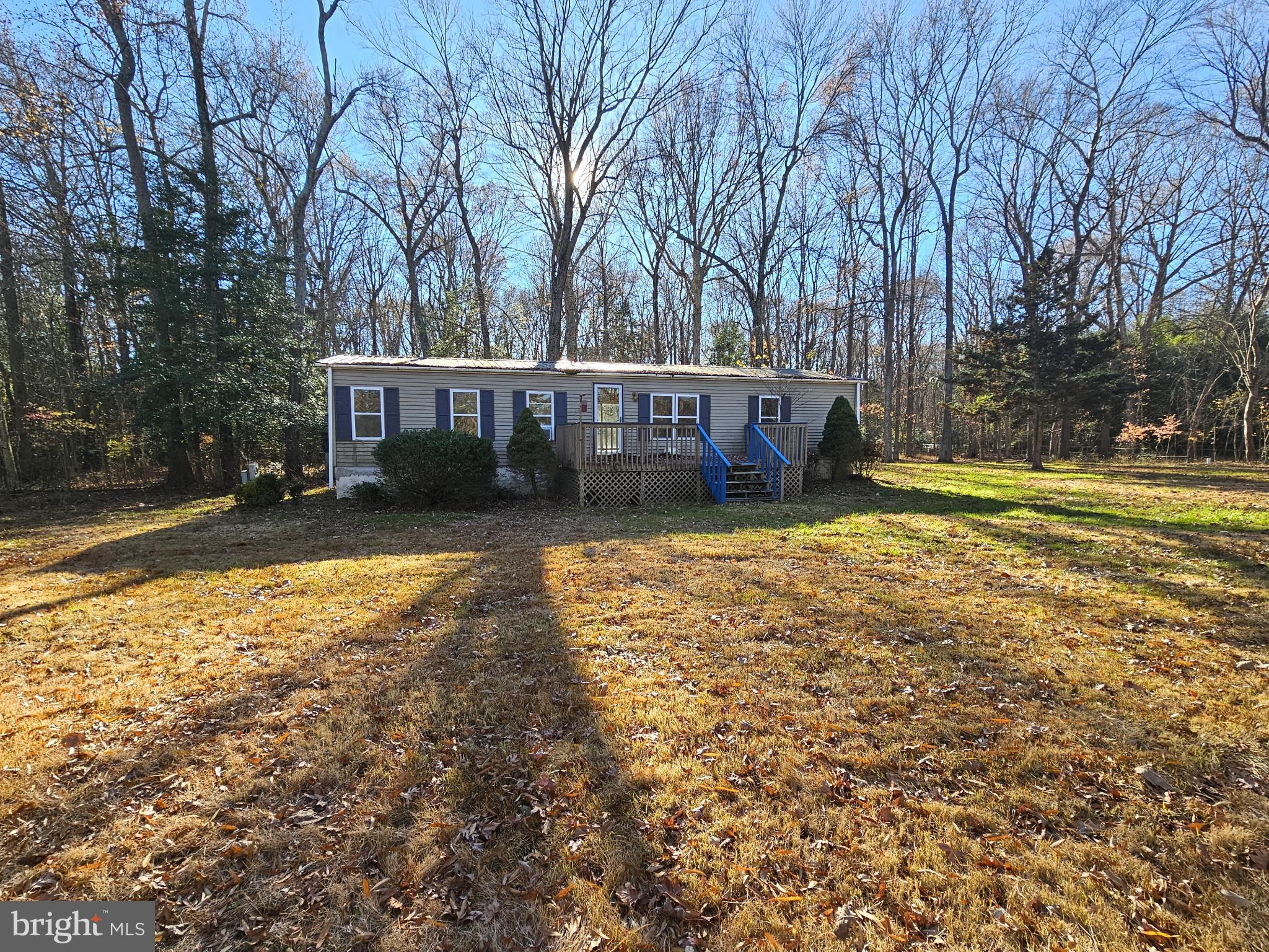 7350 Park Brown Road Harrington, DE 19952 - Photo 3 of 8 a view of a house with yard and trees