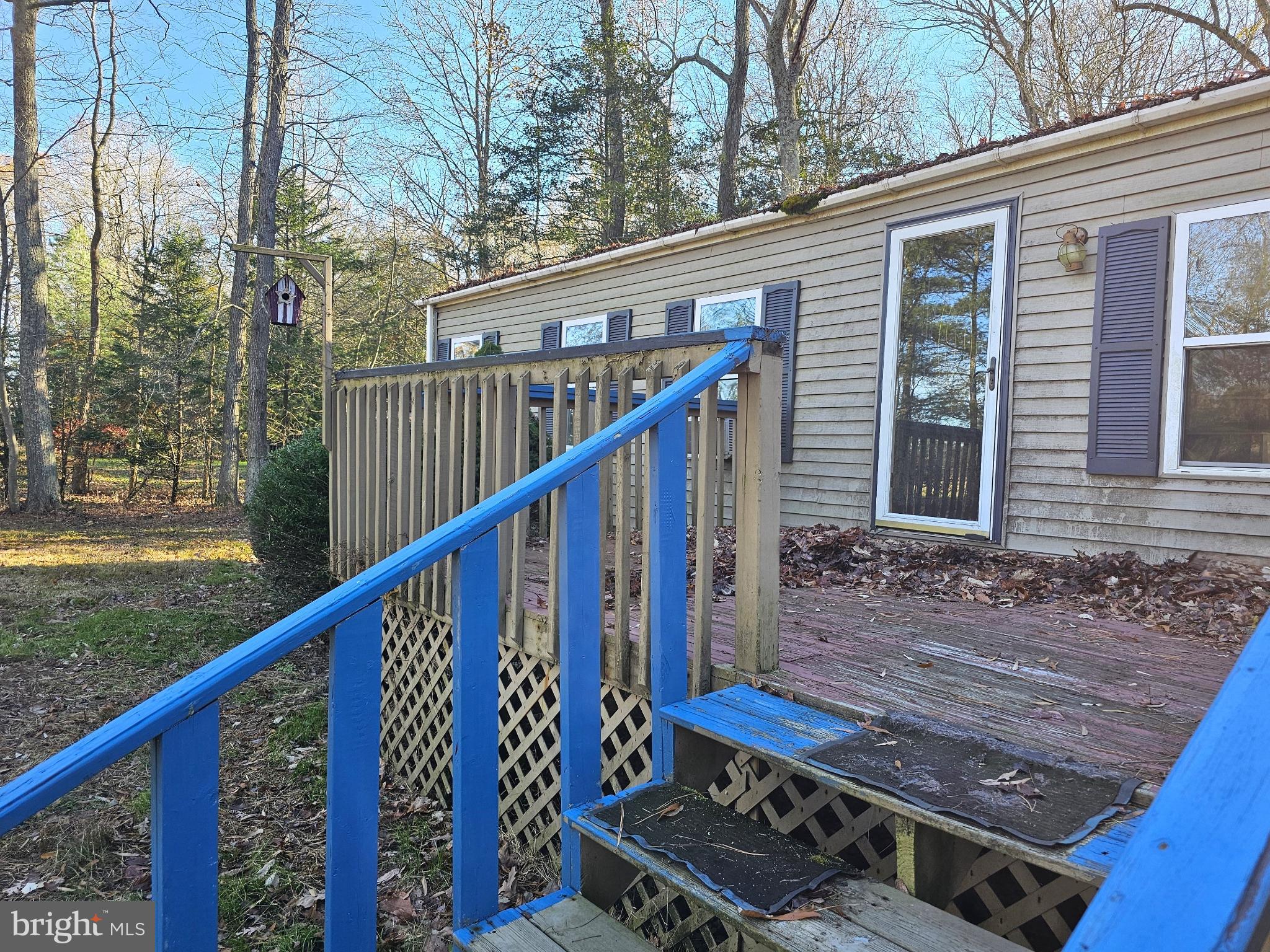 7350 Park Brown Road Harrington, DE 19952 - Photo 4 of 8 a view of a roof deck with wooden floor and fence