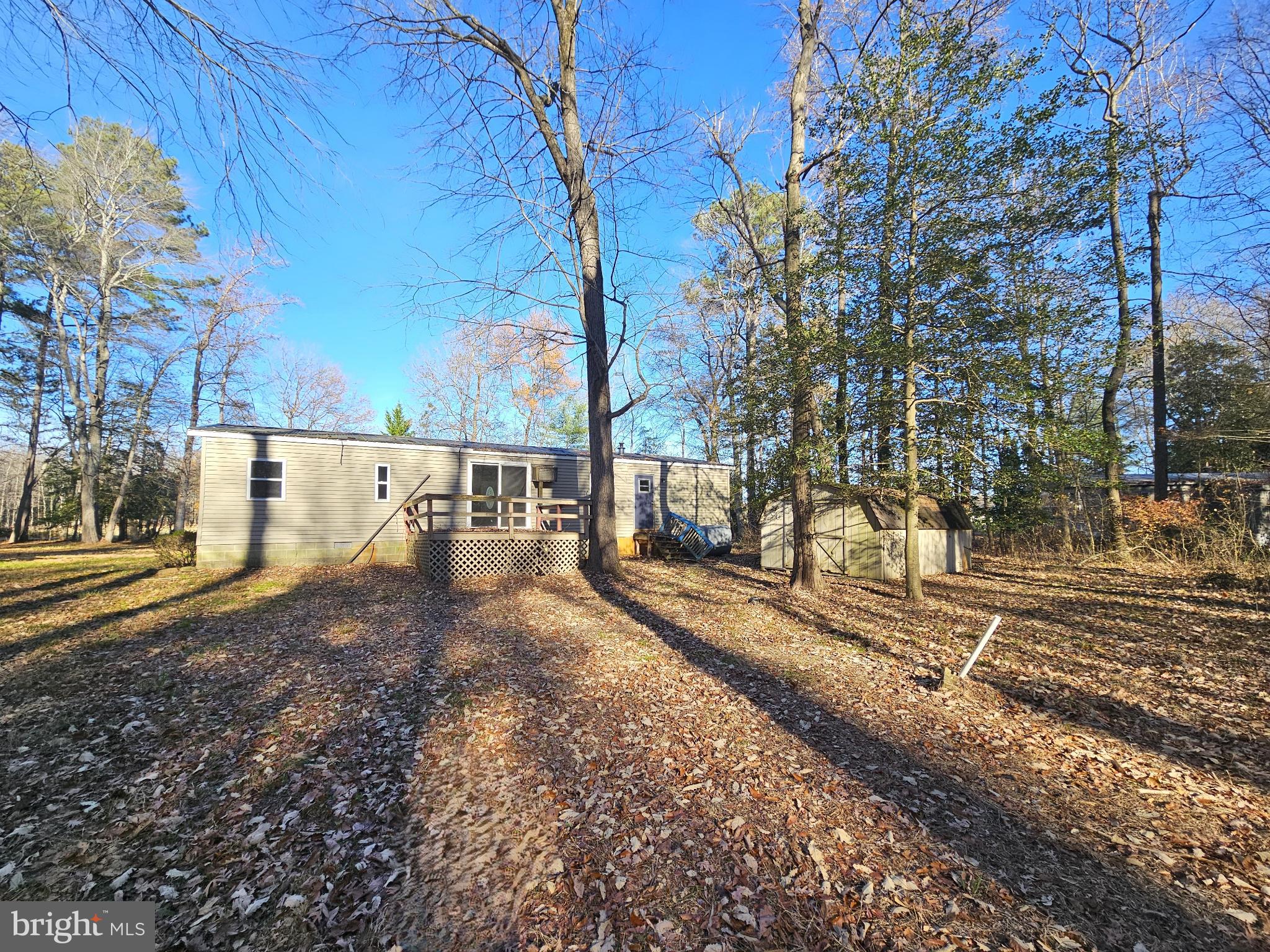 7350 Park Brown Road Harrington, DE 19952 - Photo 8 of 8 a view of a yard with wooden fence