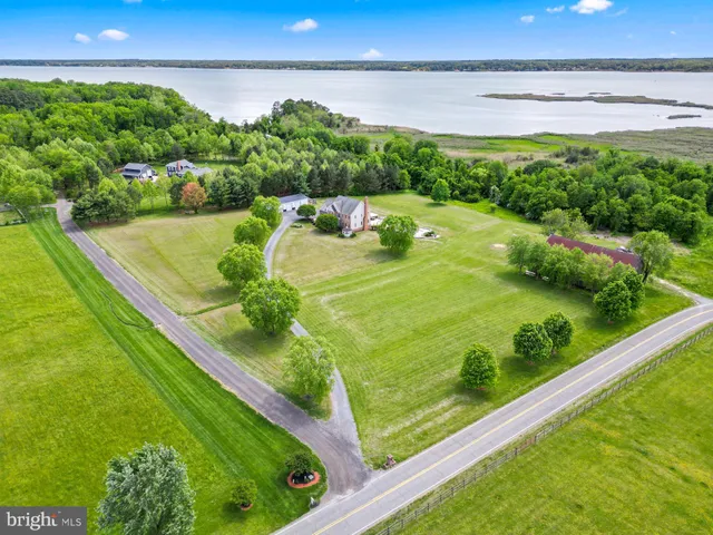 an aerial view of a house with a garden
