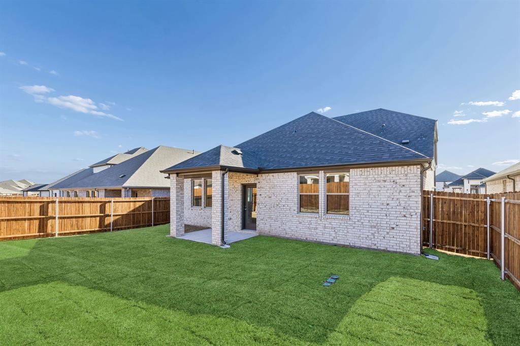 1145 Del Rio Drive Lavon, TX 75166 - Photo 35 of 35 Covered Patio in the Haylee home plan by Trophy Signature Homes - REPRESENTATIVE PHOTO