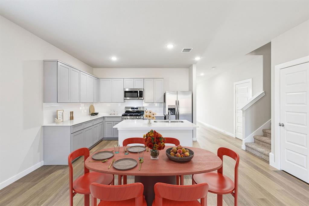 1145 Del Rio Drive Lavon, TX 75166 - Photo 9 of 35 Kitchen in the Haylee home plan by Trophy Signature Homes - REPRESENTATIVE PHOTO