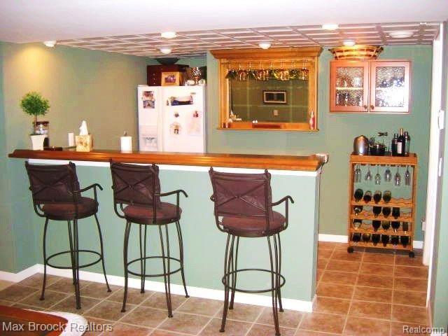 351 Jonathan Drive Rochester, MI 48307 - Photo 13 of 21 FINISHED BASEMENT W/WET BAR