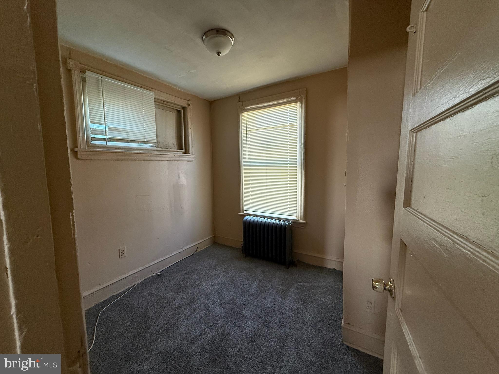 2413 West Indiana Avenue Philadelphia, PA 19132 - Photo 5 of 9 a view of an empty room with a window