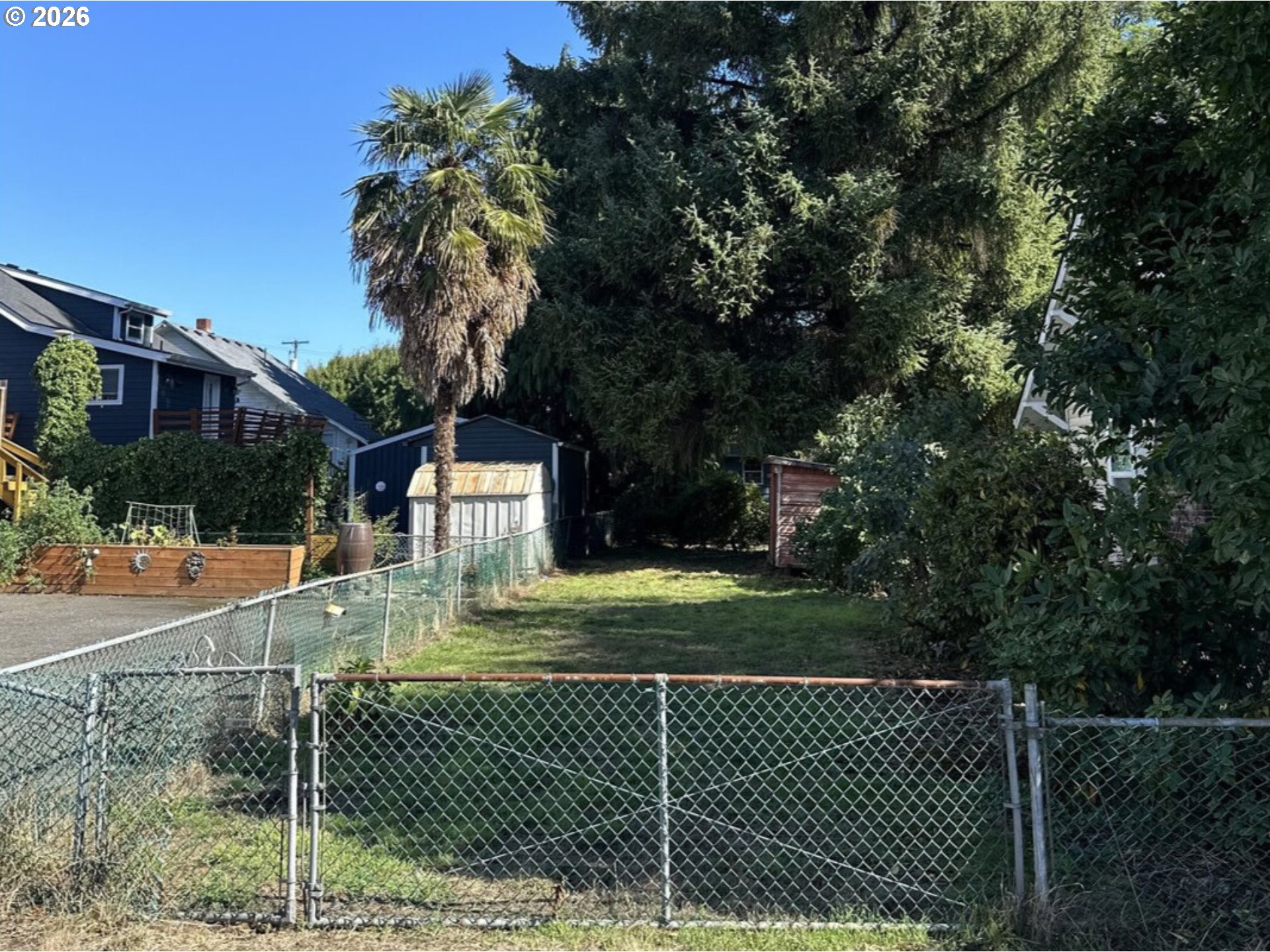 2-12 Northeast Bridgeton Road Portland, OR 97211 - Photo 4 of 8 a front view of a house with a yard