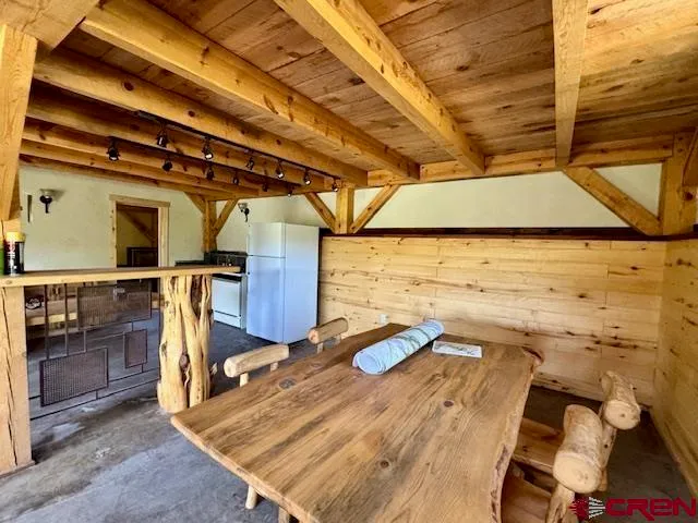 a view of a hallway with windows