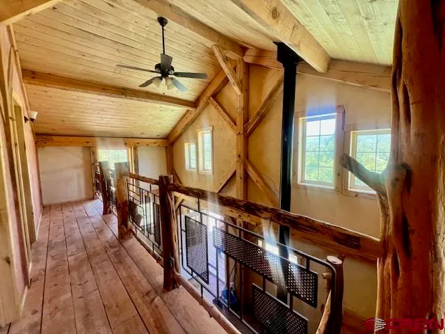 a view of a city with lush green forest
