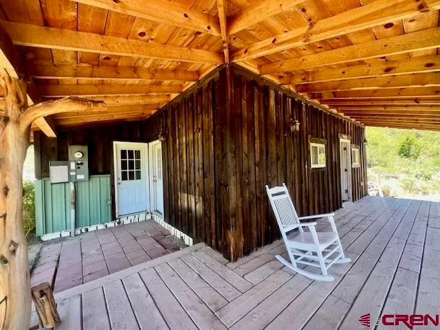 a view of balcony with wooden floor and outdoor space