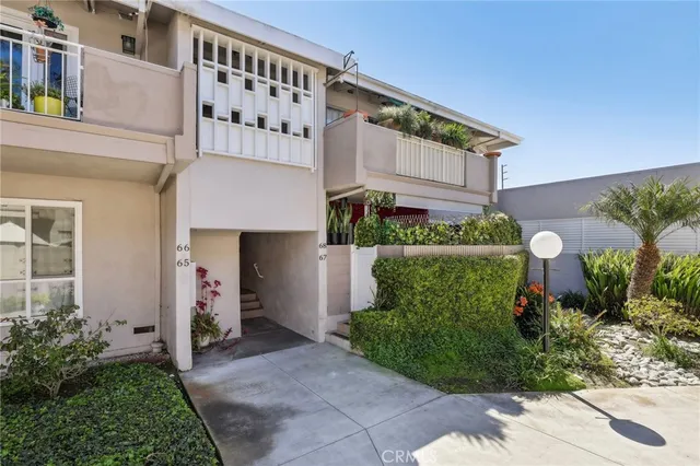 front view of a house with a chair