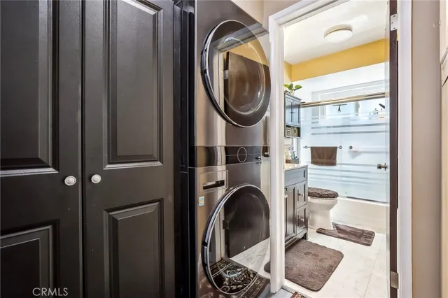 a close view of a utility room with washer and dryer