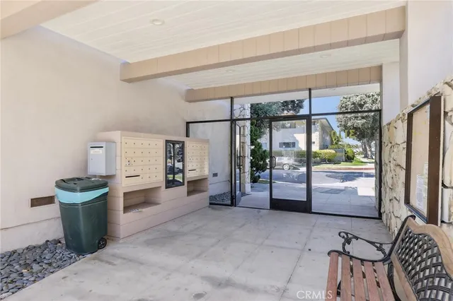 a room with furniture and a large window