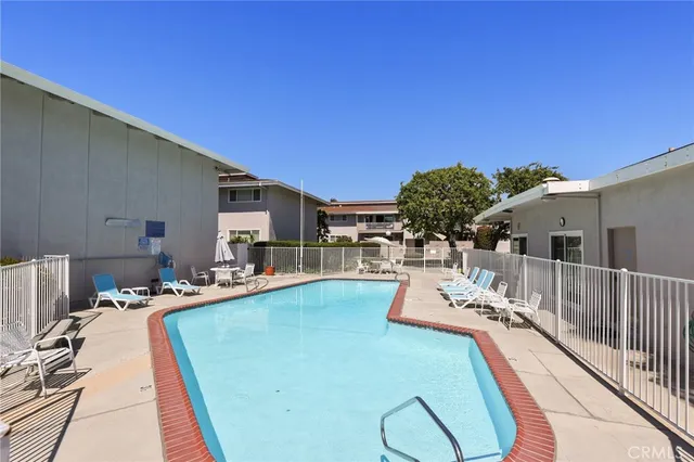 a house view with a sitting space and garden space