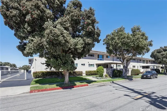 a building with trees in front of it