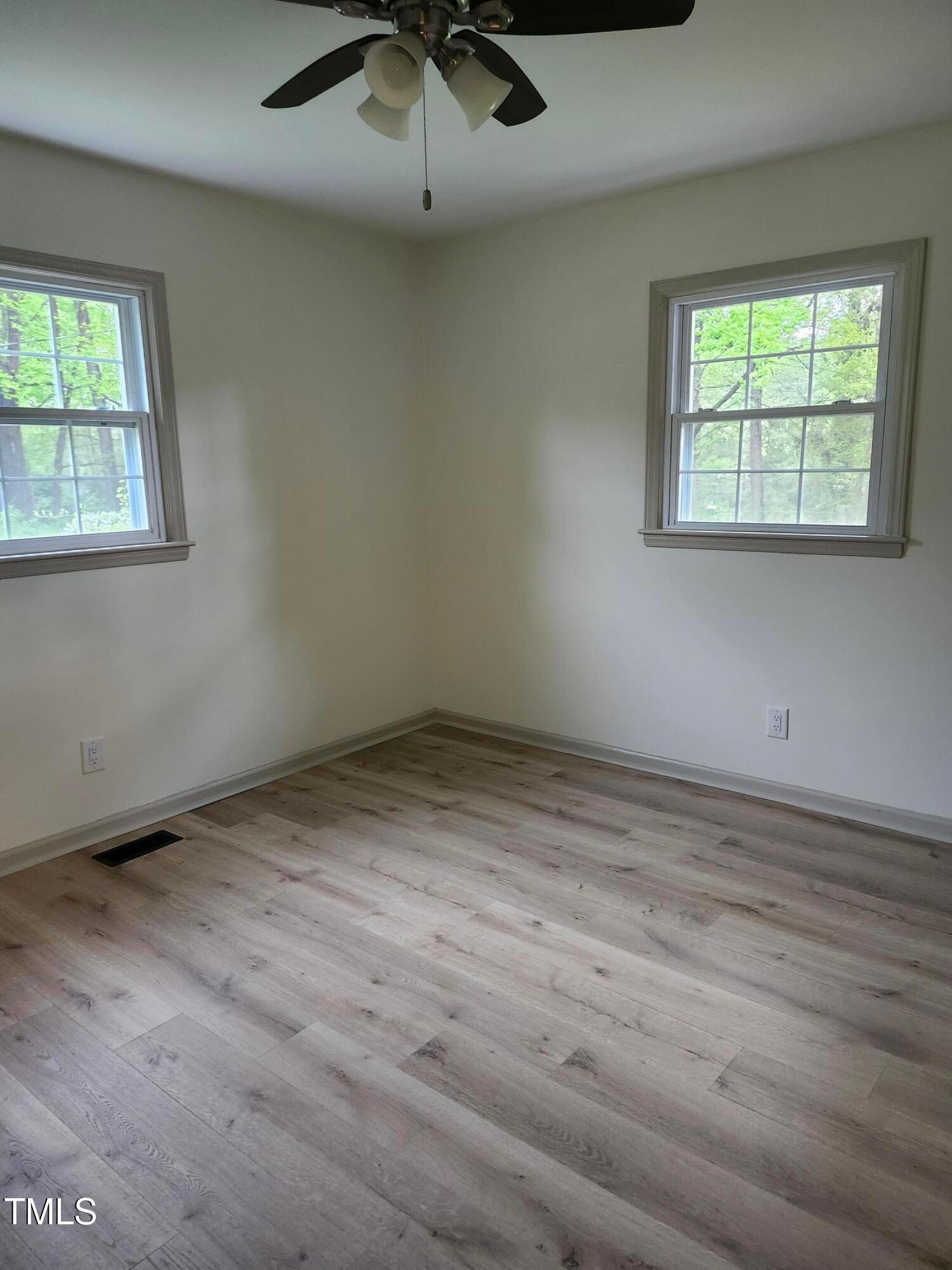 2546 Ardsley Drive Durham, NC 27704 - Photo 4 of 11 an empty room with a window