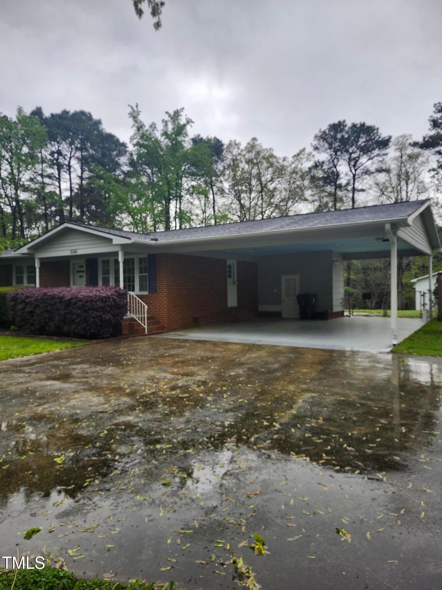 2546 Ardsley Drive Durham, NC 27704 - Photo 10 of 11 a front view of a house with a yard
