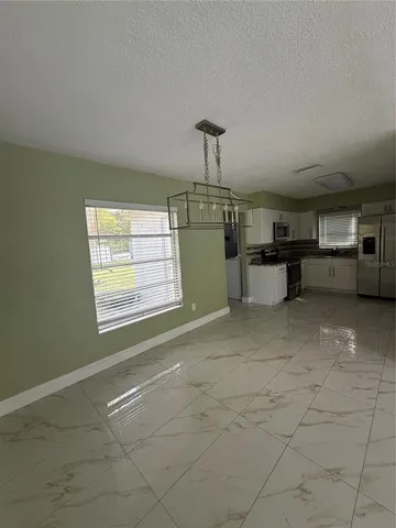 a view of storage and utility room with washer and dryer