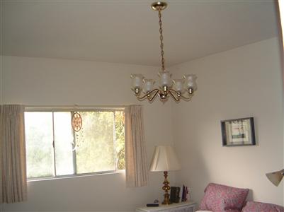 8721 Occidental Road Sebastopol, CA 95472 - Photo 4 of 9 a view of a room with a chandelier windows and wooden floor