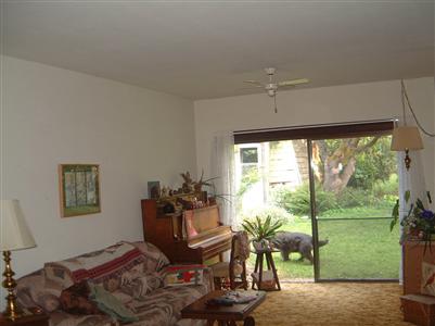 8721 Occidental Road Sebastopol, CA 95472 - Photo 5 of 9 a living room with furniture and a large window