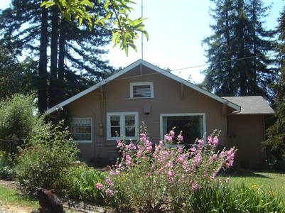 8721 Occidental Road Sebastopol, CA 95472 - Photo 9 of 9 a front view of house with flowers