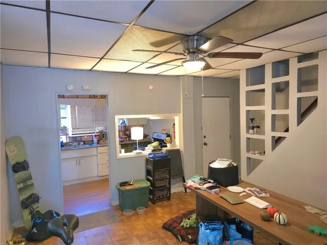 a bathroom with a sink toilet and a shower