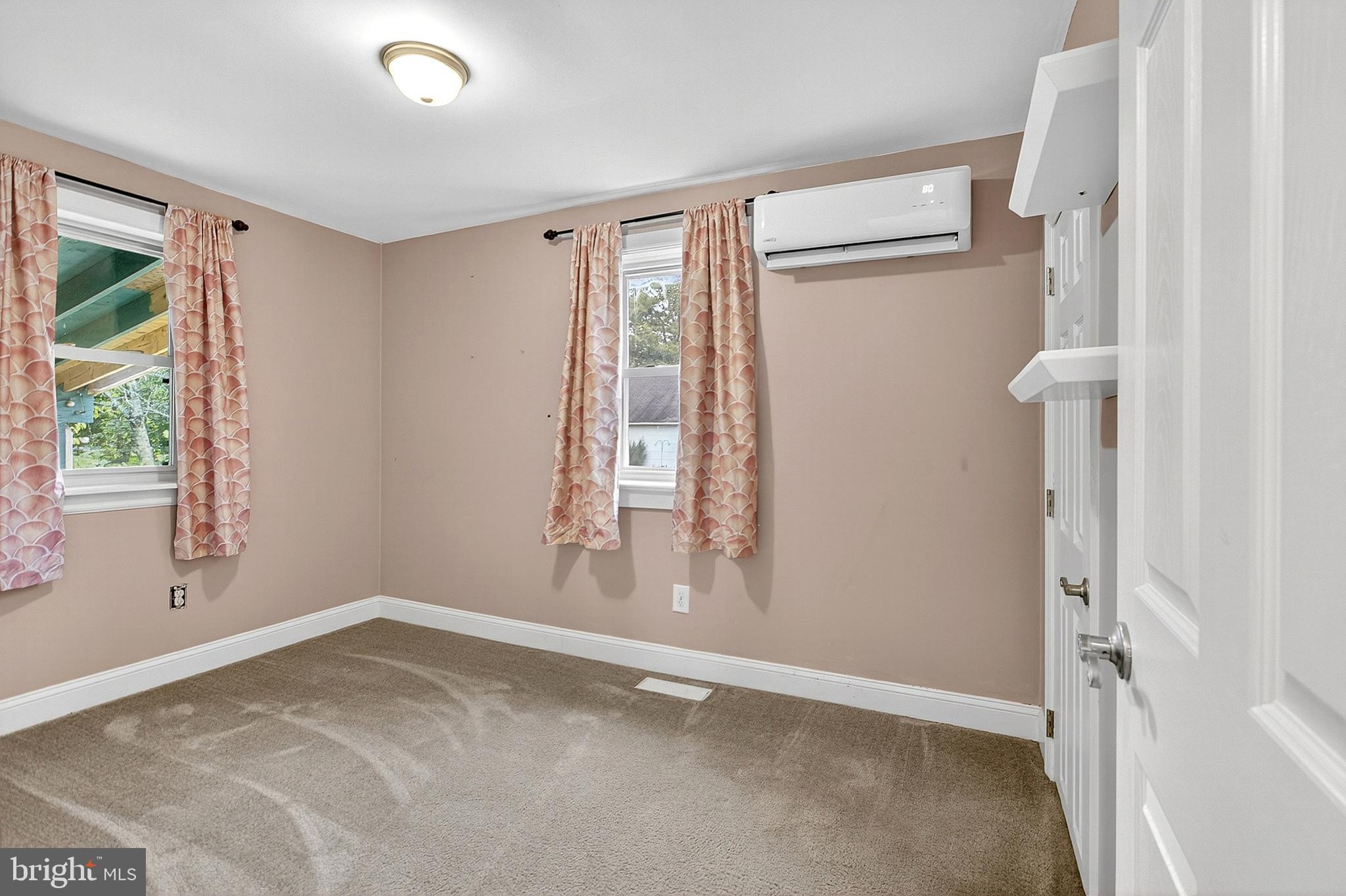 138 Diamond Street Hatfield, PA 19440 - Photo 13 of 33 a view of an empty room with a window