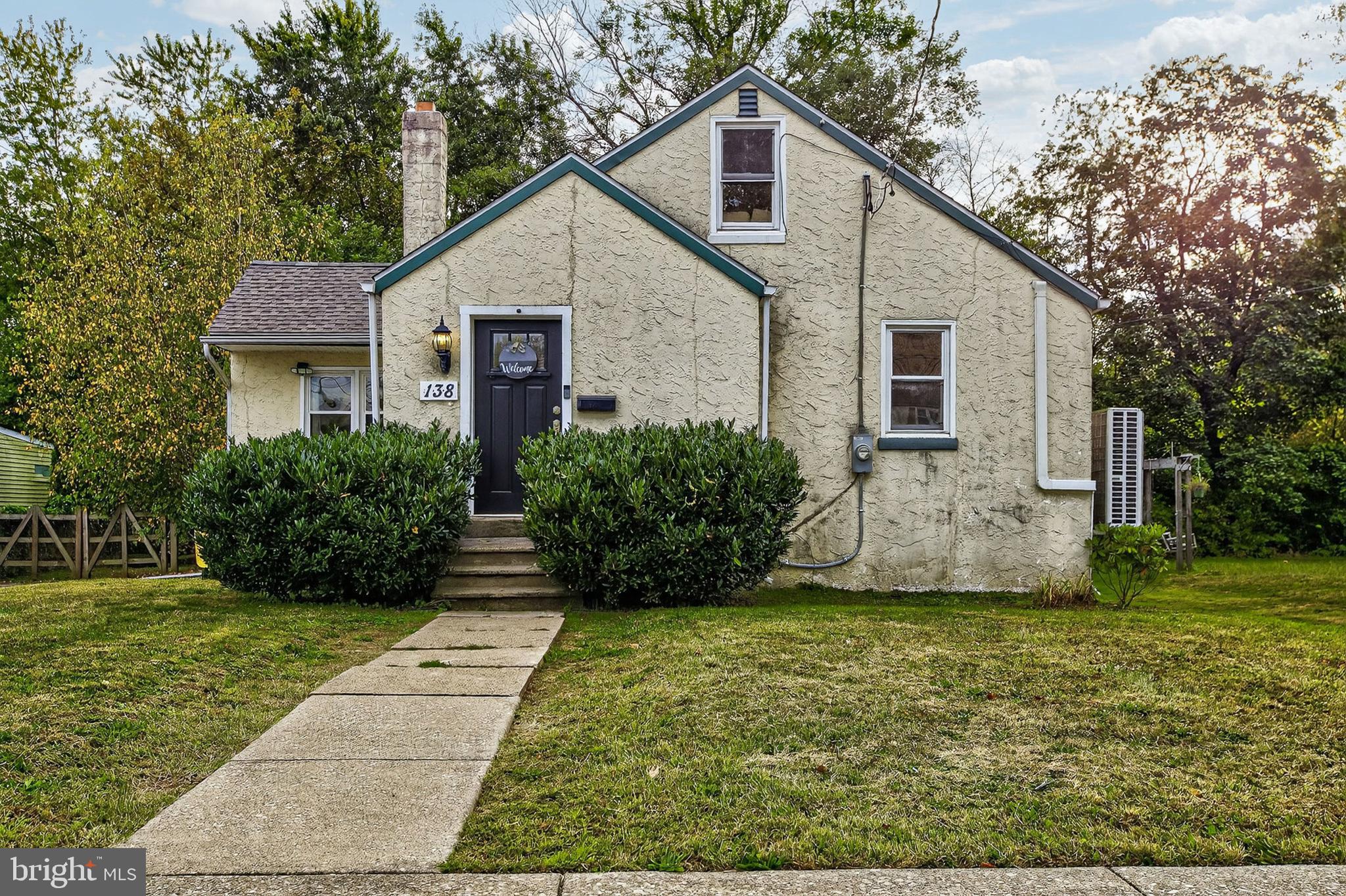 138 Diamond Street Hatfield, PA 19440 - Photo 2 of 33 a front view of house with yard and green space