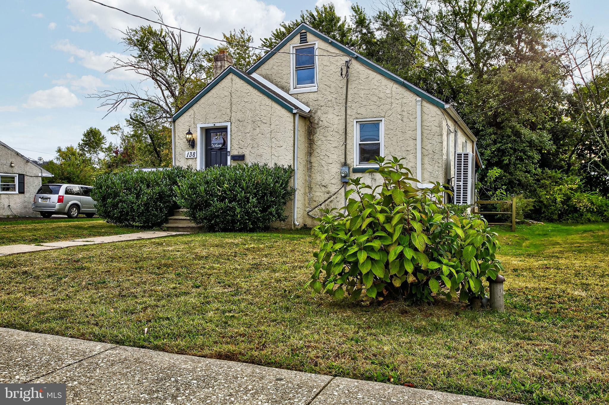 138 Diamond Street Hatfield, PA 19440 - Photo 3 of 33 a front view of a house with garden