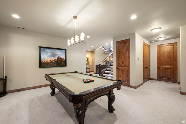 2331 West Entrada Trail, Unit 61 St. George, UT 84770 - Photo 36 of 69 Carpeted recreational space featuring recessed lighting and a decorative linear chandelier