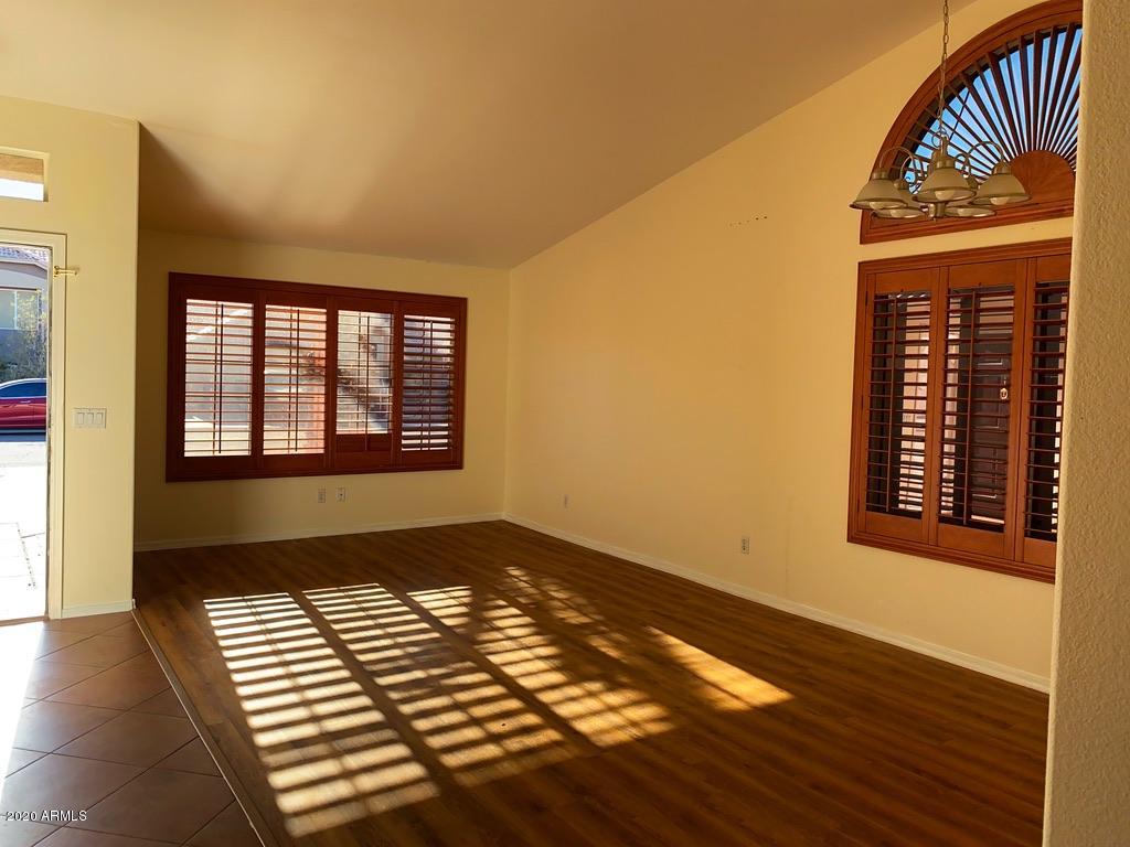 844 North Granite Street Gilbert, AZ 85234 - Photo 2 of 12 a view of a room with wooden floor and a window