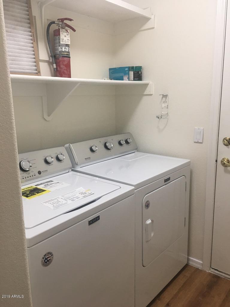 844 North Granite Street Gilbert, AZ 85234 - Photo 9 of 12 a utility room with dryer and washer