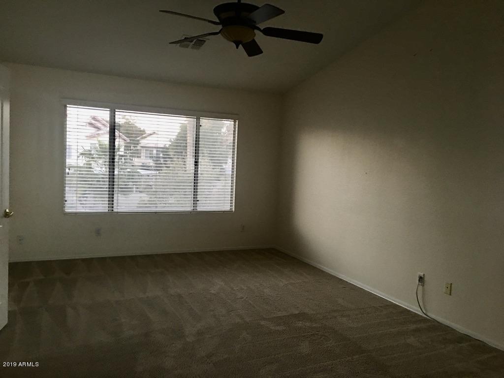 844 North Granite Street Gilbert, AZ 85234 - Photo 10 of 12 an empty room with a window