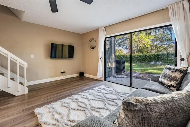 a view of a livingroom with furniture and wooden floor