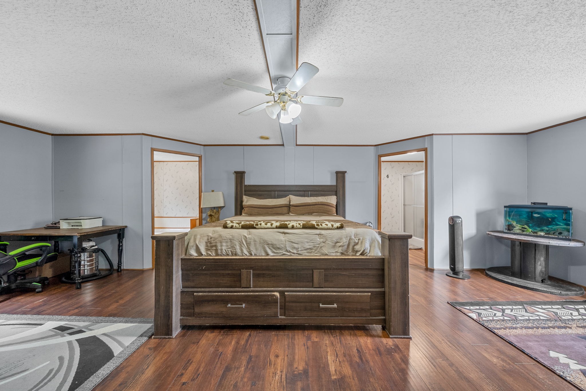 242 Barn Circle Road Big Rock, TN 37023 - Photo 13 of 40 a bedroom with a bed and wooden floor