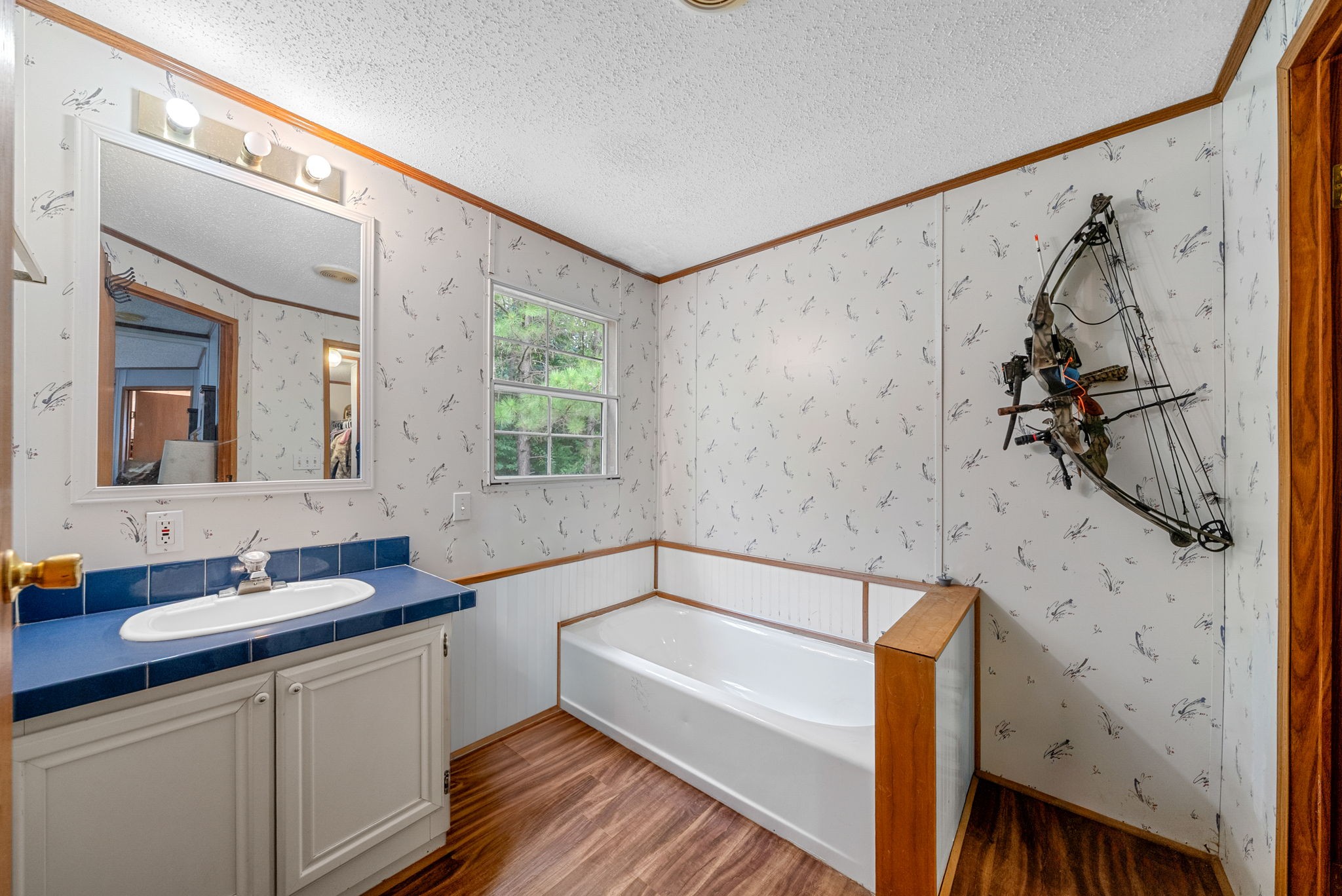 242 Barn Circle Road Big Rock, TN 37023 - Photo 19 of 40 a bathroom with a bathtub and a sink