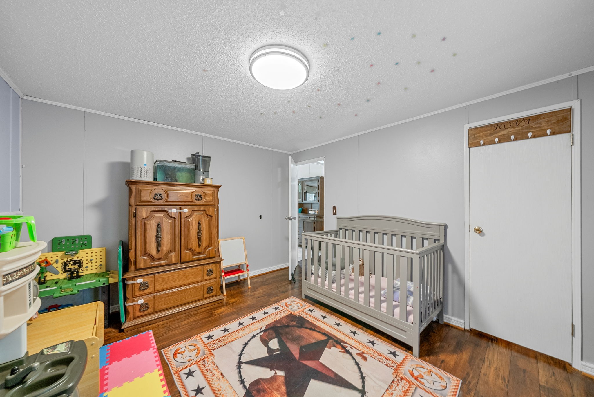 242 Barn Circle Road Big Rock, TN 37023 - Photo 22 of 40 a bedroom with furniture and a window