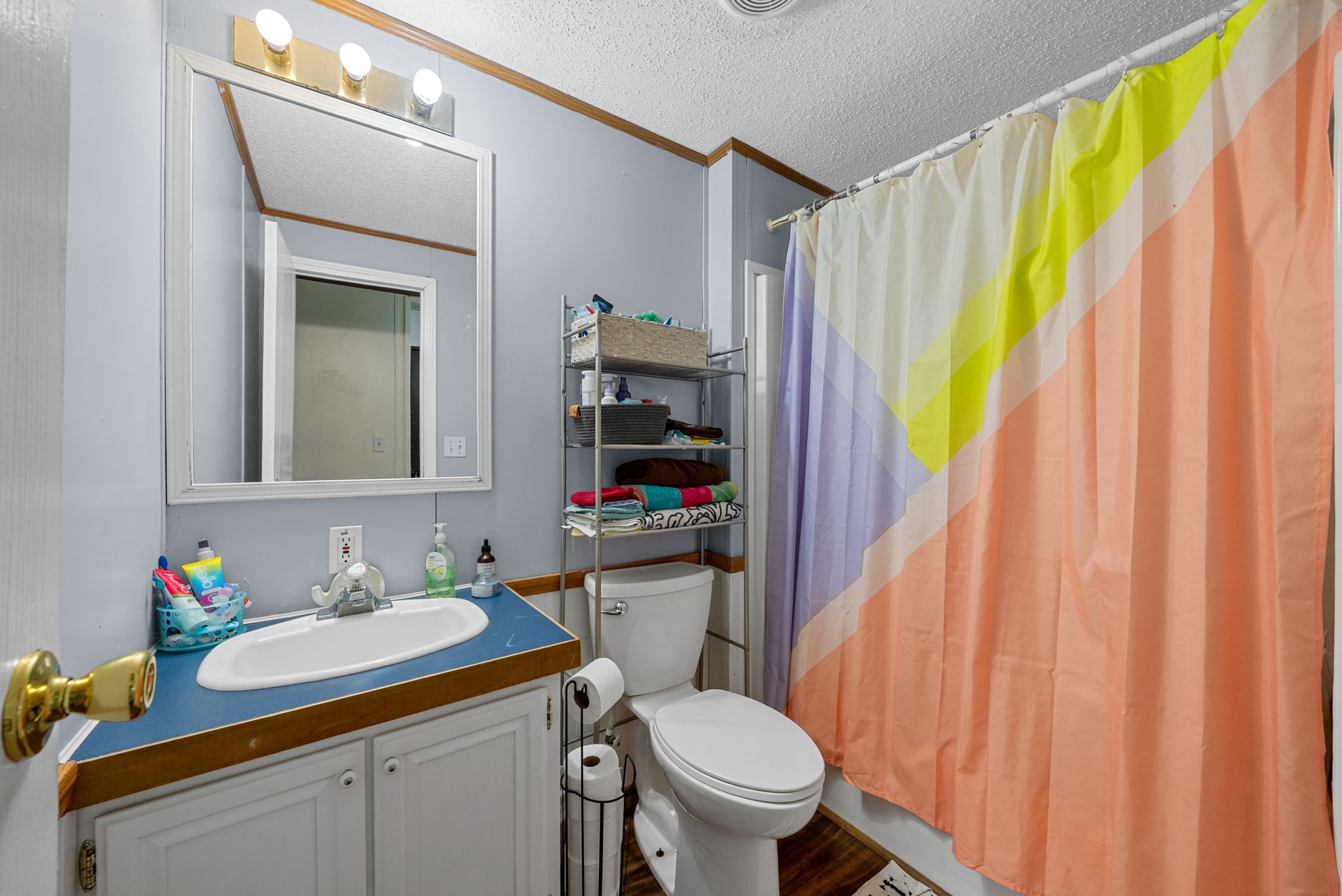 242 Barn Circle Road Big Rock, TN 37023 - Photo 23 of 40 a bathroom with a sink toilet and shower