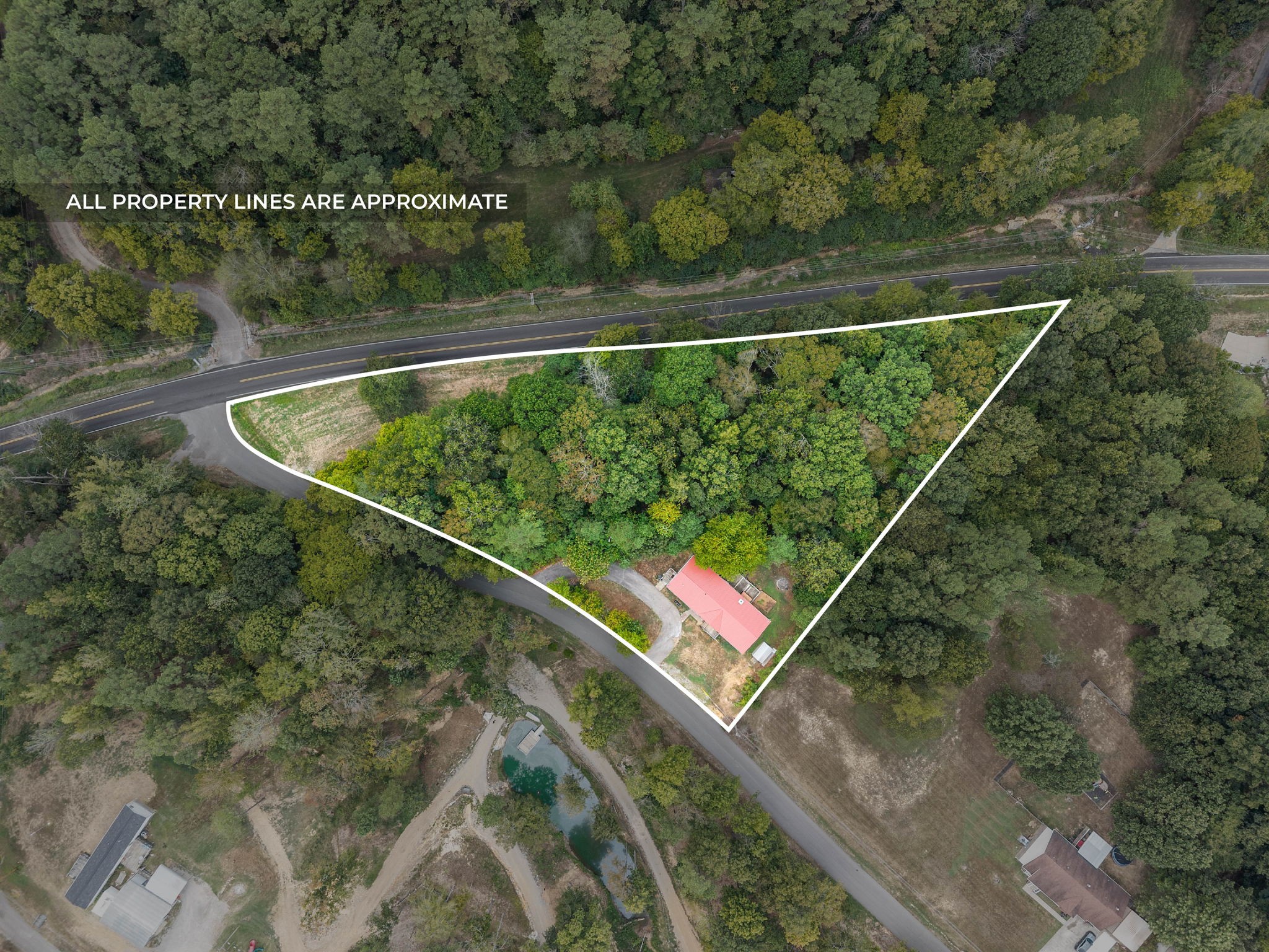 242 Barn Circle Road Big Rock, TN 37023 - Photo 38 of 40 a view of a swimming pool with a yard