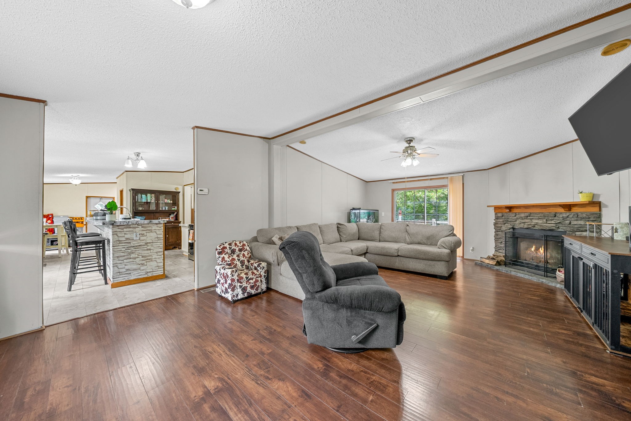 242 Barn Circle Road Big Rock, TN 37023 - Photo 4 of 40 a living room with furniture and a fireplace