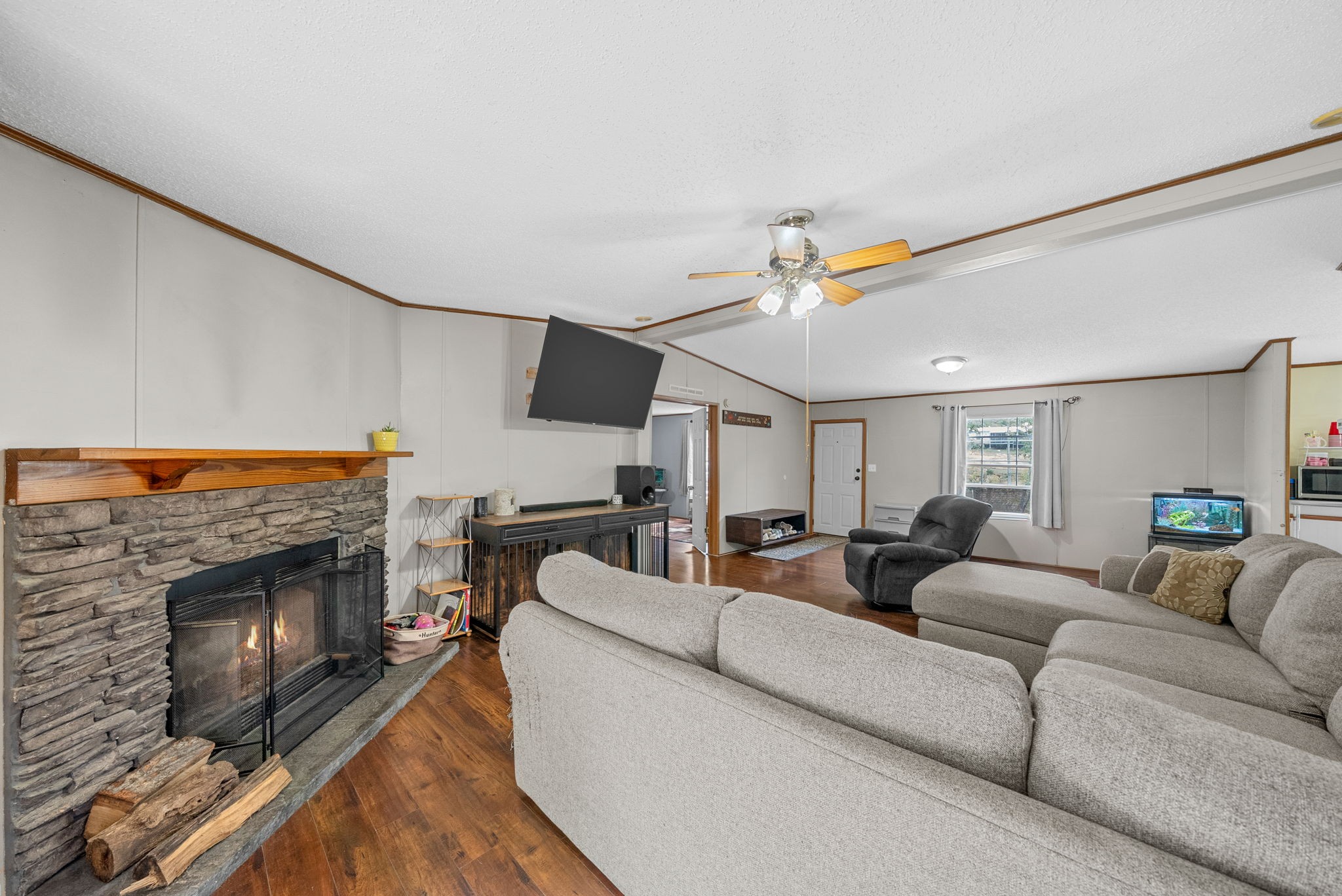 242 Barn Circle Road Big Rock, TN 37023 - Photo 6 of 40 a living room with furniture and a fireplace