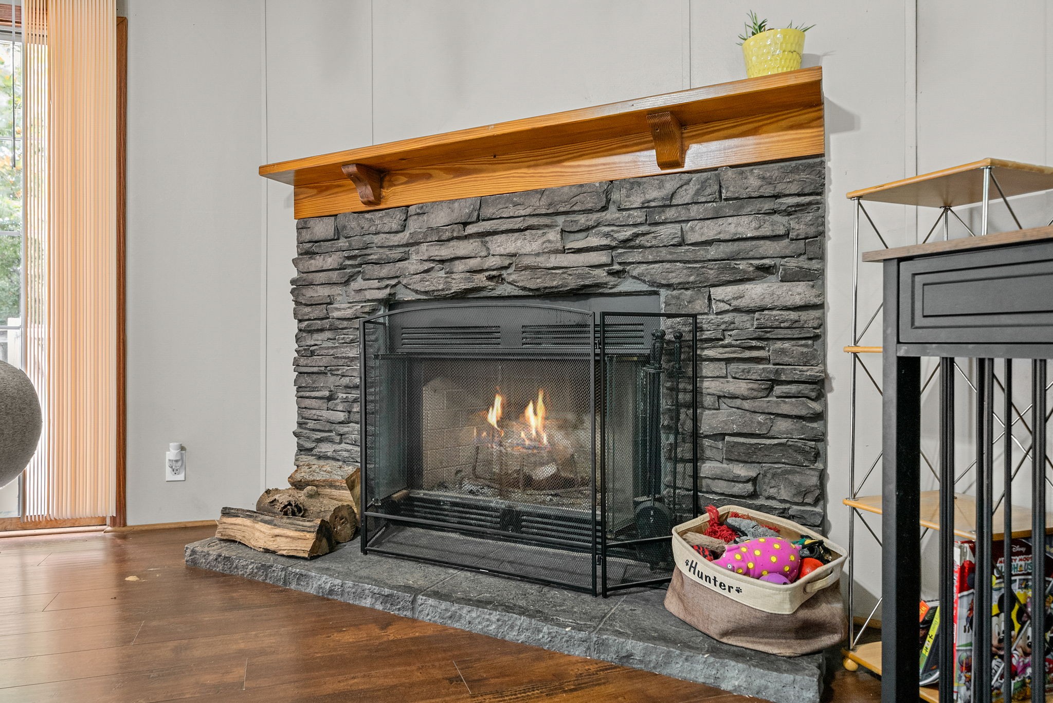 242 Barn Circle Road Big Rock, TN 37023 - Photo 7 of 40 a room with fireplace and two windows