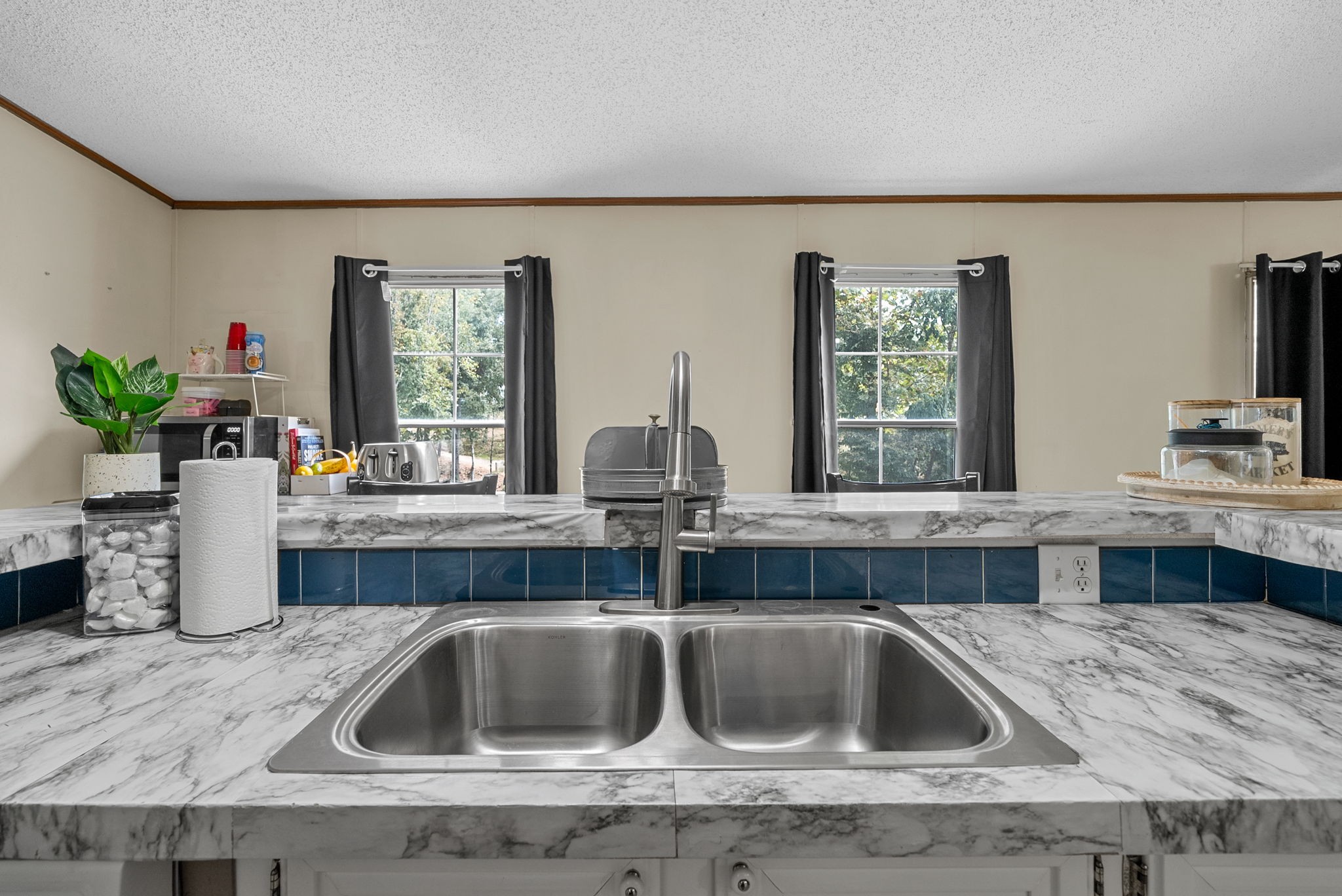 242 Barn Circle Road Big Rock, TN 37023 - Photo 10 of 40 a kitchen with a sink and a window